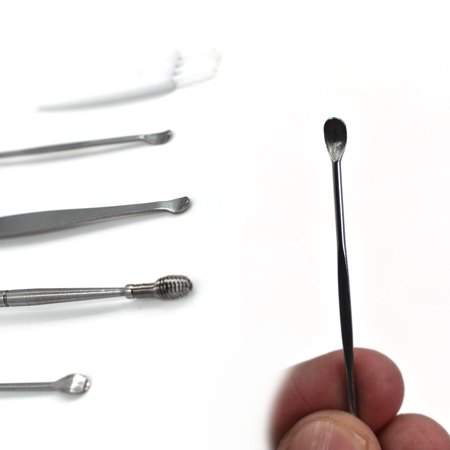 All six stainless steel earwax removal tools neatly arranged on a clean white background.