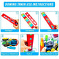 Transparent domino train set laying a long chain of colorful blocks.