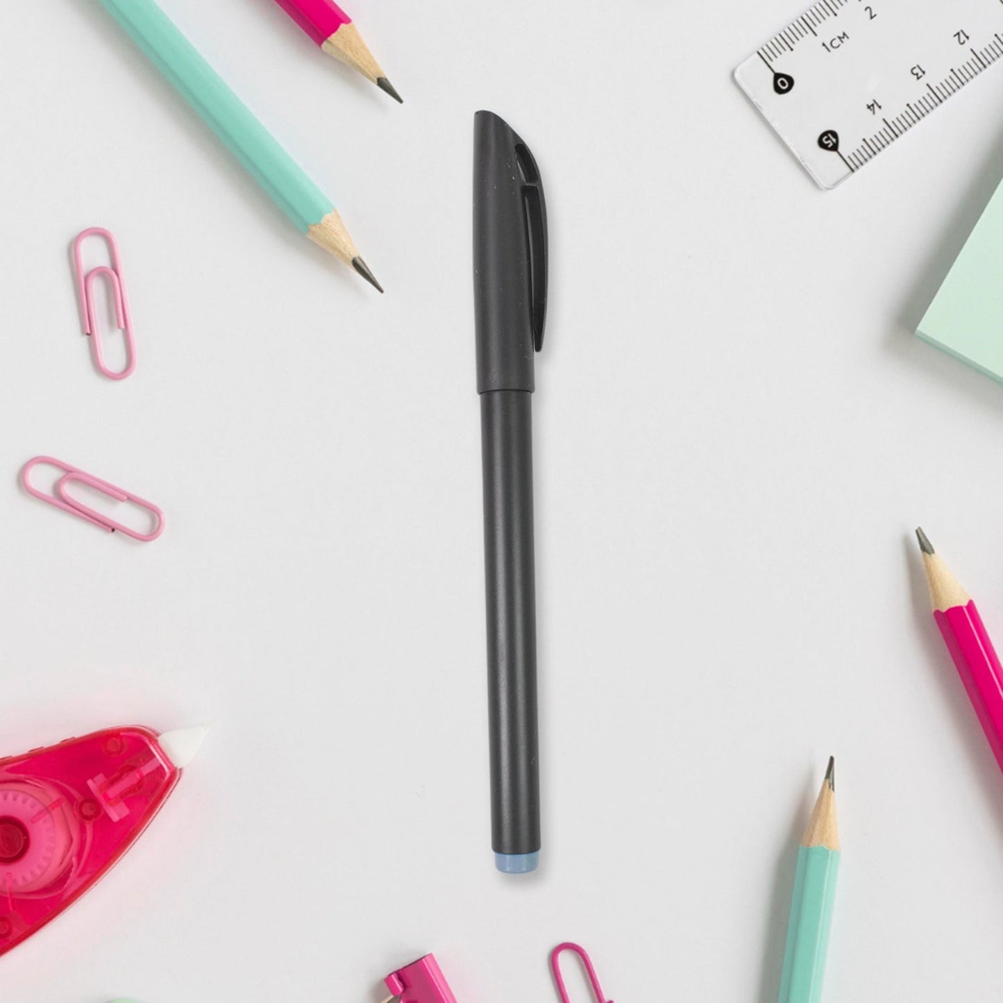 Macro shot of a black gel pen's ink gliding across paper, showing smudge-free results.