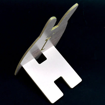 Close-up of the wooden rabbit mobile stand's detail and craftsmanship.
