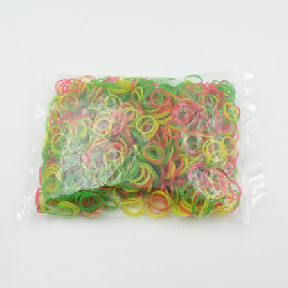 Assorted flexible elastic bands in a pile, perfect for stationery and school use.
