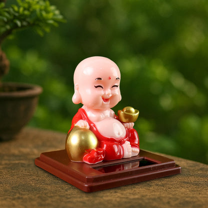 Packaging for the Solar Buddha Car Ornament, detailing product features and dimensions.