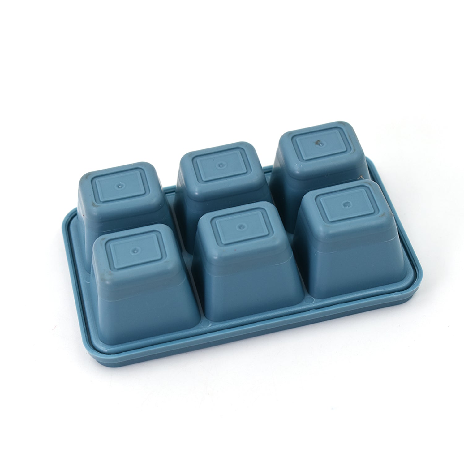 Multiple blue silicone ice trays stacked together, showcasing easy storage.