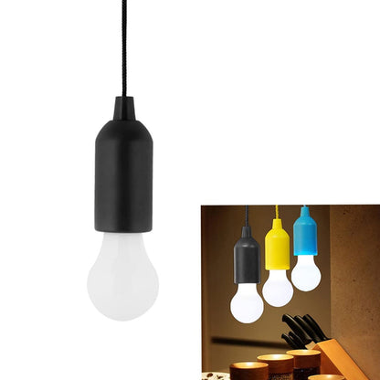 Hand holding the lightweight LED pull cord light, ready for use anywhere.