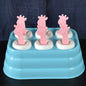 6-cavity giraffe shaped plastic ice cube molds on a white surface