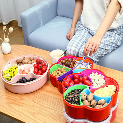 Clear 5 compartment snack box filled with various dry fruits and nuts.