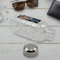 Transparent plastic mukhwas bottle with steel cap on white background