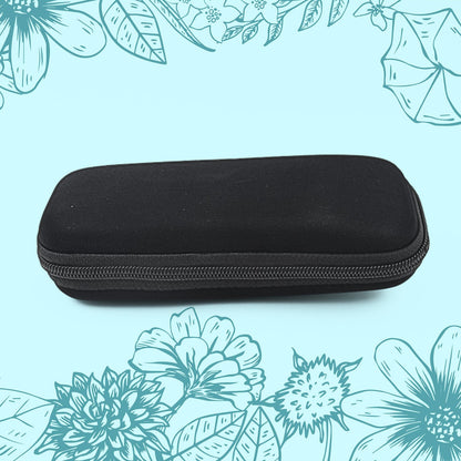 A black, rectangular zippered case with rounded corners is centered against a light blue background with floral outlines.