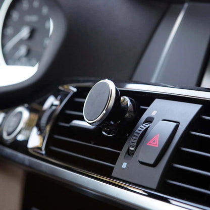 Minimalist style magnetic car phone holder mounted on air vent