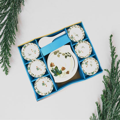 Elegant 9-piece pudding serving set arranged on a table.