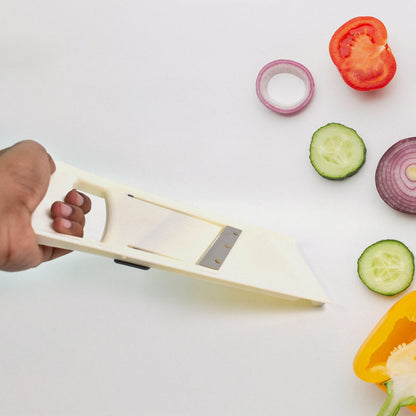 Various thin slices of vegetables demonstrating the multi-slice capability.