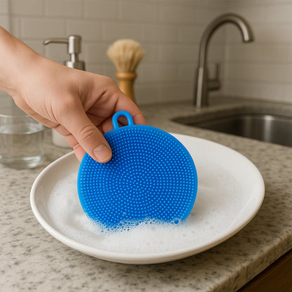 Top-down view of the ergonomic, circular silicone dish scrubber.