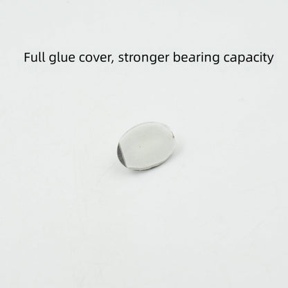 A single capsule-shaped stainless steel hook demonstrating its strong adhesive backing.