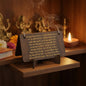 Wooden Hanuman Chalisa flip book displayed on a tabletop stand