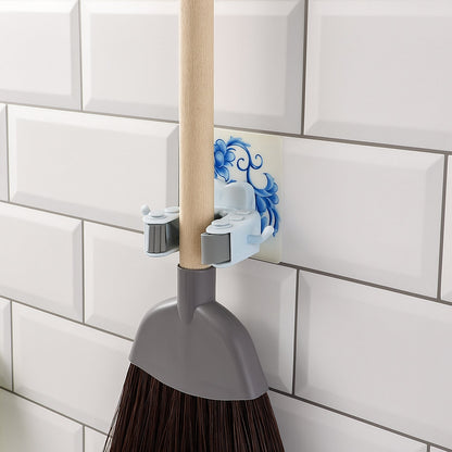 Back view of wall mounted mop and broom holder showing strong adhesive