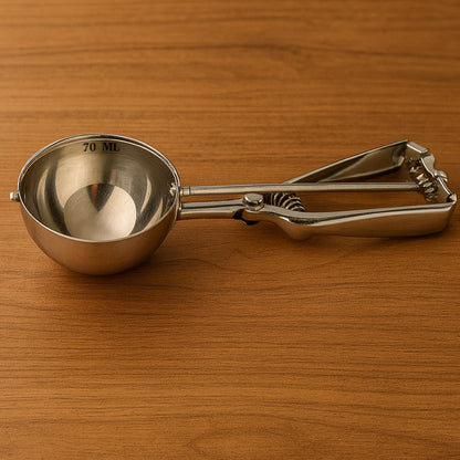 Stainless steel ice cream scoop featuring a comfortable trigger handle