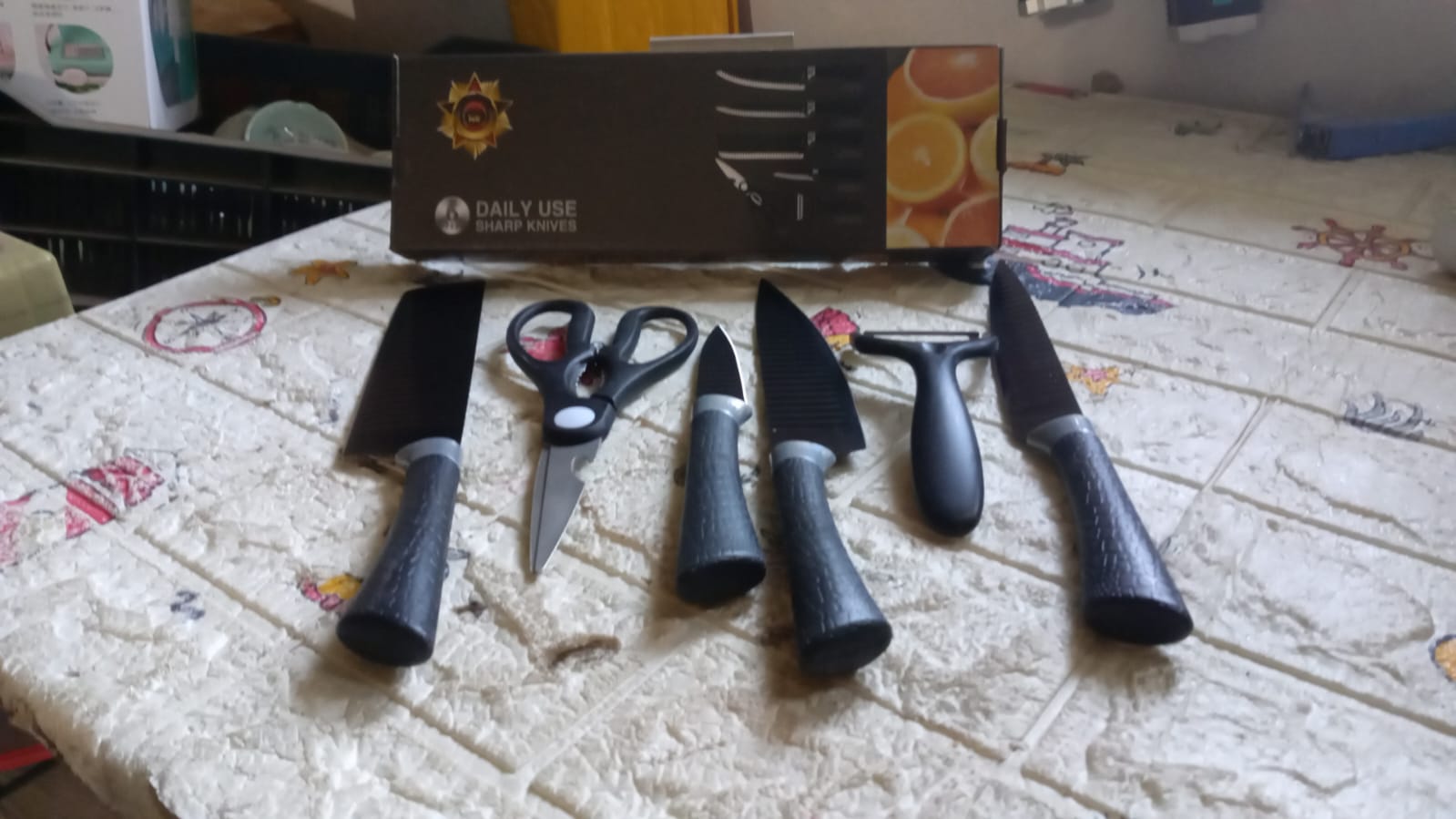 The complete 6-piece Kitchen Knife Set by CookAura beautifully displayed on a wooden surface.