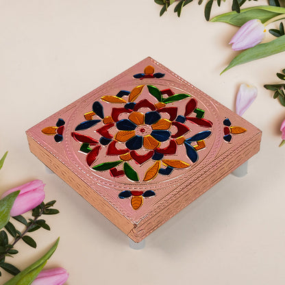 Square-shaped wooden bajot with detailed Meenakari artwork for puja rituals.