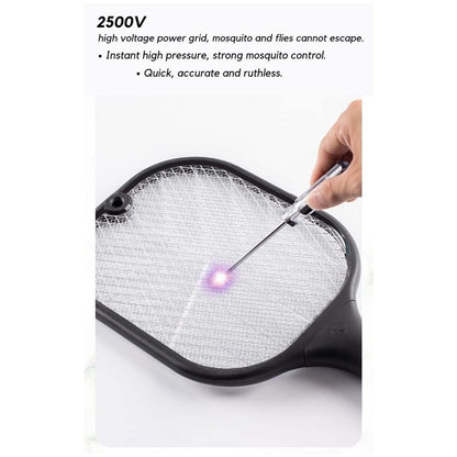 A hand uses a metal probe to demonstrate the purple light of the electric grid on a black mosquito killer racket.