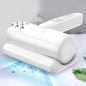 Dust Mite Controller USB rechargeable device on fabric surface