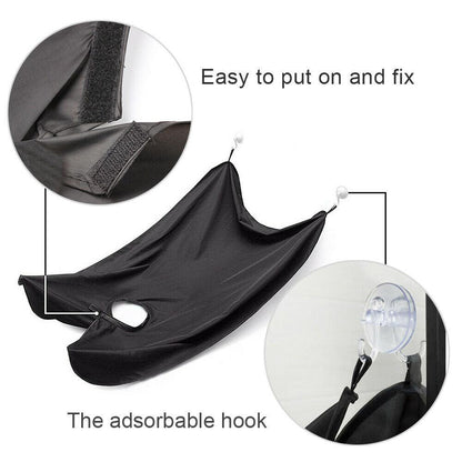 Beard apron efficiently capturing all hair clippings during a precise beard trim.