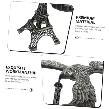 The Balancing Eagle Toy displayed on a modern wooden desk, adding a unique and intriguing accent to the workspace.