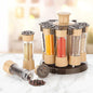 Revolving spice rack with 8 transparent jars displayed on a kitchen counter.