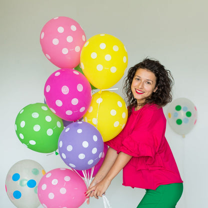 Multicolor balloons creating a cheerful atmosphere for a Holi celebration.