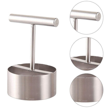 Fruit corer lying on a kitchen counter, highlighting its sleek design.