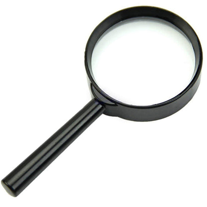 Portable 50mm magnifying glass for reading small print in a newspaper.