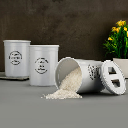 Overhead view of the three damru-shaped plastic food storage containers.