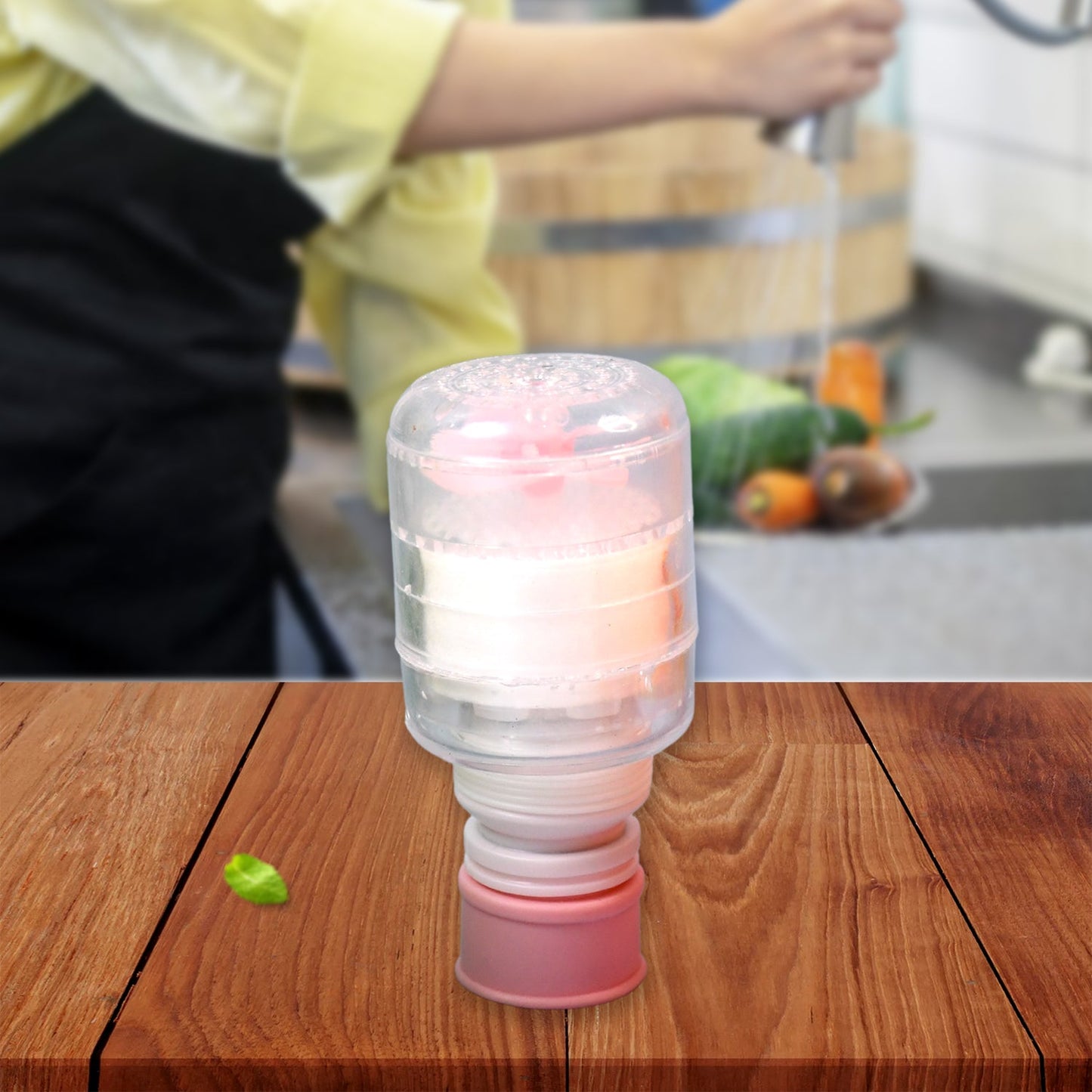 Close-up of stretchable faucet extender highlighting built-in filter