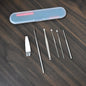 Complete 6-piece Earwax Removal Kit with stainless steel tools and a sleek portable case.
