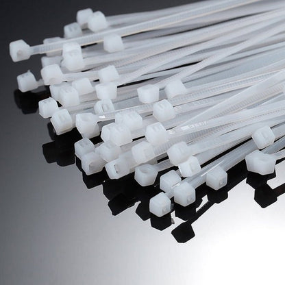 Bundle of strong 6-inch black nylon cable ties ready for use.
