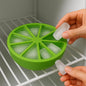 Flexible silicone ice cube tray making lemon-shaped ice cubes perfect for cocktails