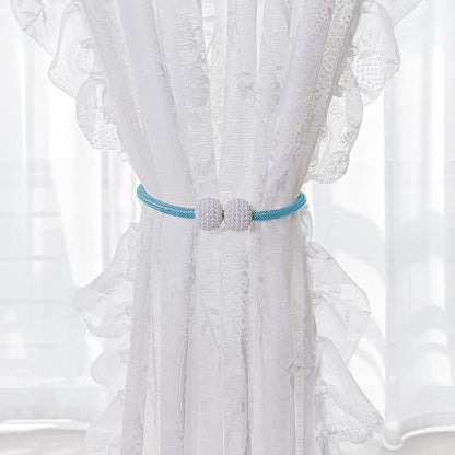Set of two magnetic curtain tiebacks featuring pearl accents