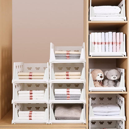 Compact stackable storage organizer with smooth-rolling casters.
