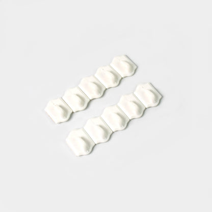 Illustration showing easy peel-and-stick installation steps for the adhesive wall hooks.