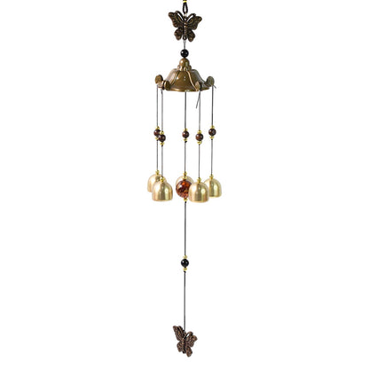Vibrant outdoor wind bell chime hanging on porch hook