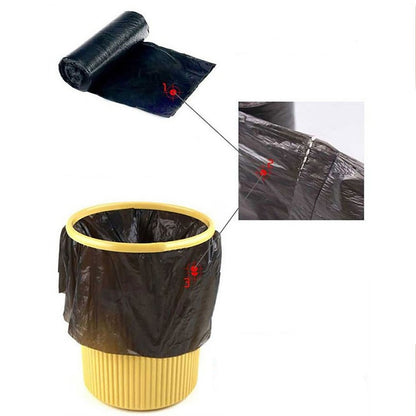 Multiple rolls of black trash bags stacked, indicating a bulk pack for household convenience.
