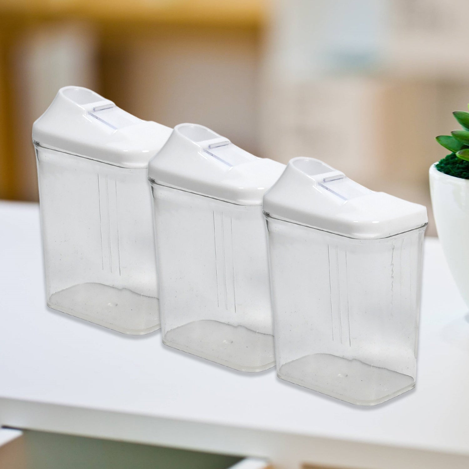 CookAura 3-piece transparent kitchen storage jars set on a countertop.