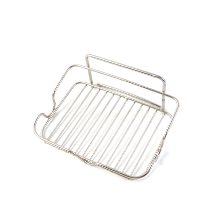 Elevated stainless steel soap stand holding bathroom essentials securely