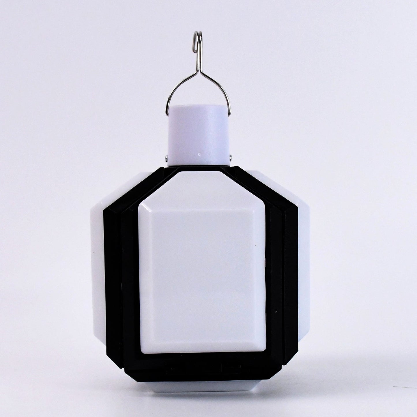 Portable camping LED light shown folded for easy travel and storage