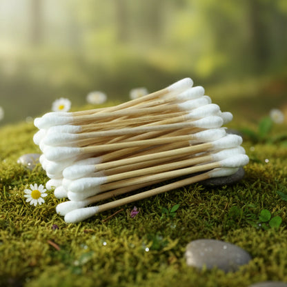 Bamboo toothbrush accompanied by cotton buds for personal care