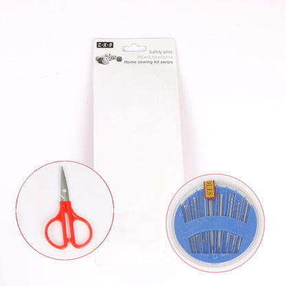 Compact sewing kit displaying assorted threads, needles, and a thimble.