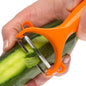 Close-up of a Y-shape vegetable peeler with a sharp stainless steel blade.