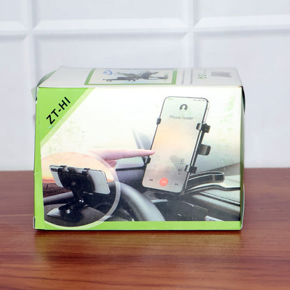 Compact rotating phone holder designed for vehicle interior use