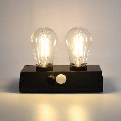 Indo Glow Solar Double LED Lamp providing ample light for an outdoor area.