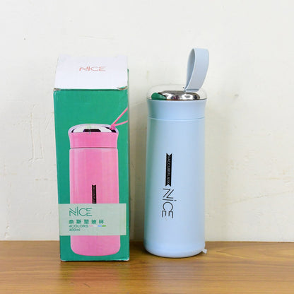 Light blue glass water bottle 400ml emphasizing eco-friendly design