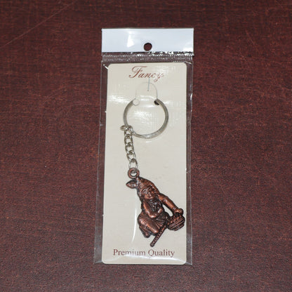 Side view of Bal Krishna metal keychain with sturdy chain and ring